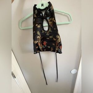 Cropped high neck, tie around back